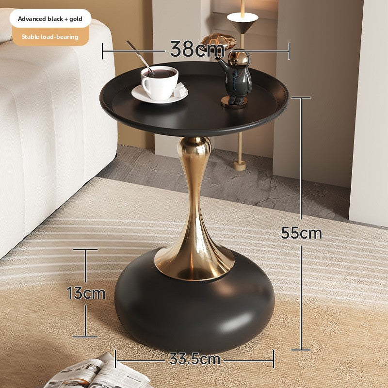 A small iron round table on the balcony
